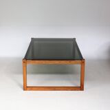 Teak coffee table with smoked glass top