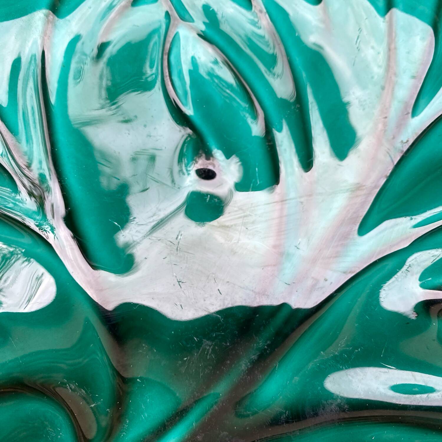 Salad bowl and small bowls in leaf-shaped slipware
