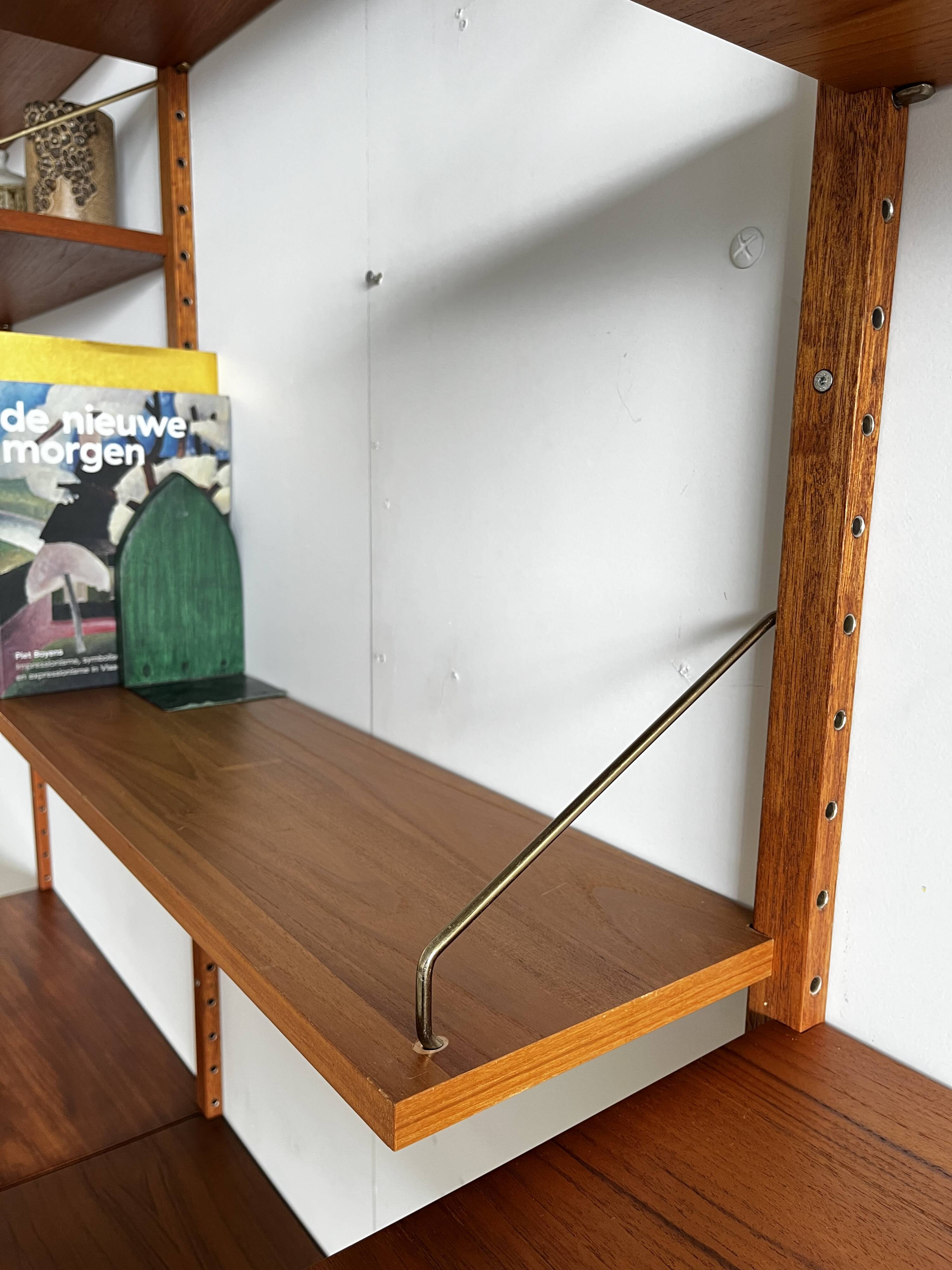 A wall unit with 4 compartments by Poul Cadovius, Denmark, 1960s.