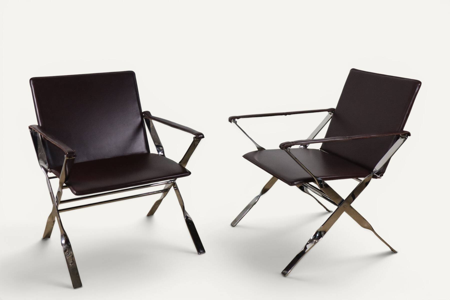 Pair of leather and chrome metal armchairs, Italy - 1970