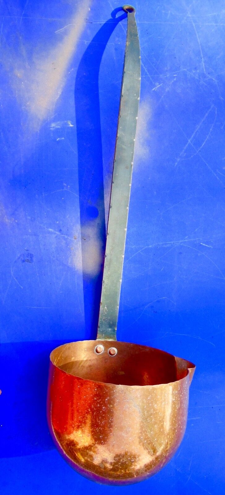 Ladle or old copper measure with spout