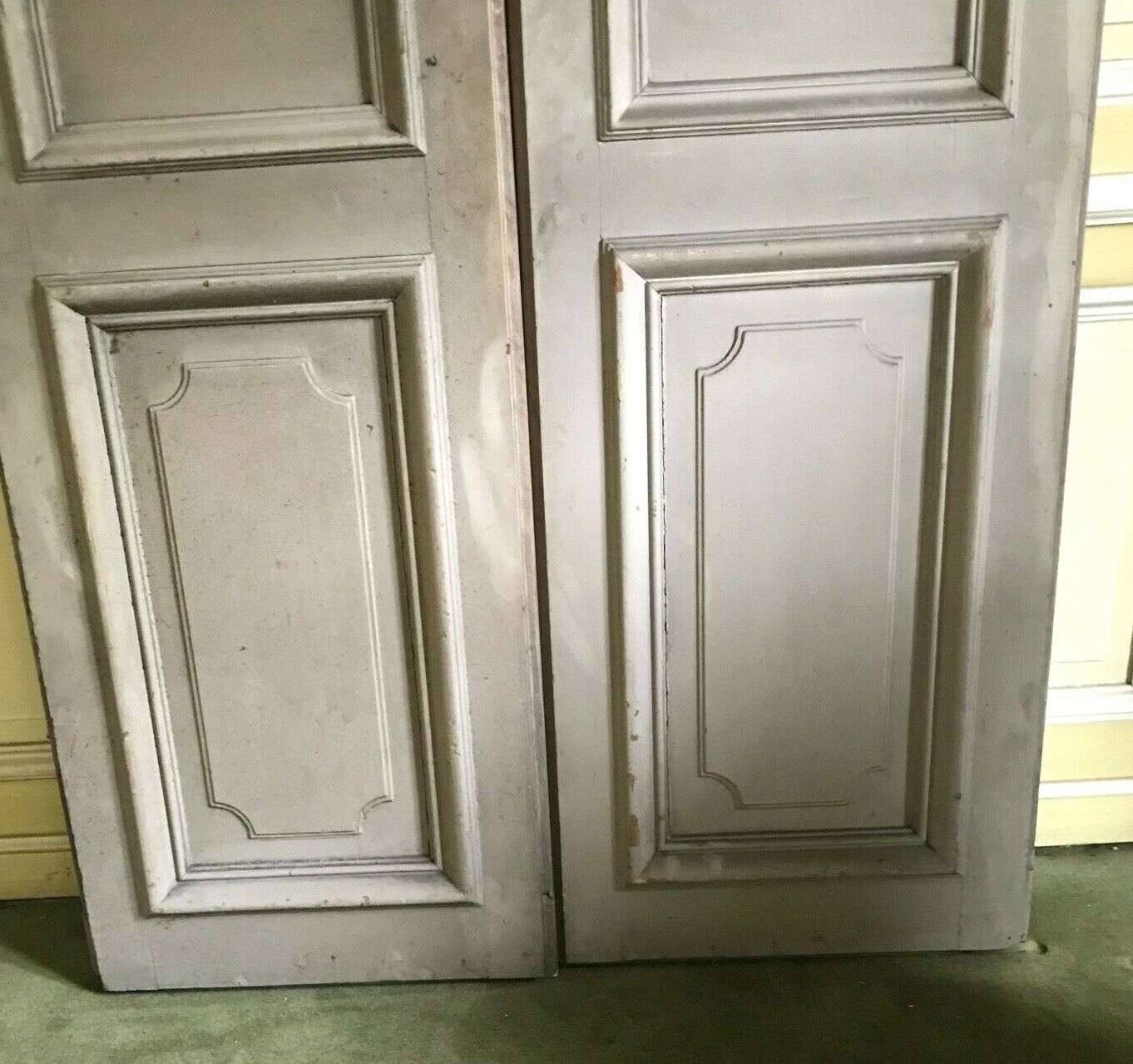 Set of two doors of passage in patinated fir XX century