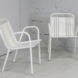 Pair of honeycomb steel armchairs. France, circa 1950.