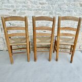 Trio of wooden chairs and mulched seat
