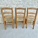 Trio of wooden chairs and mulched seat