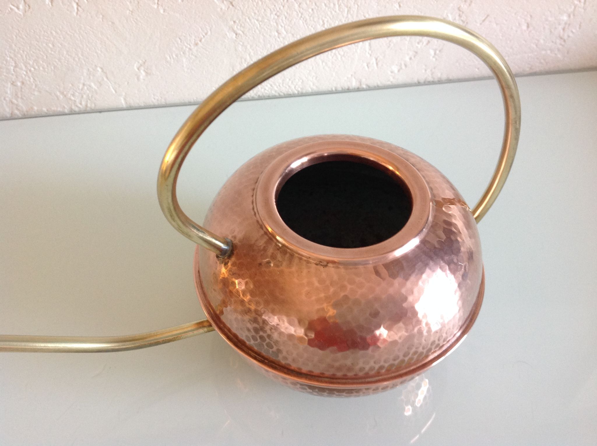 Red copper watering can in Scandinavian style 60s-70s