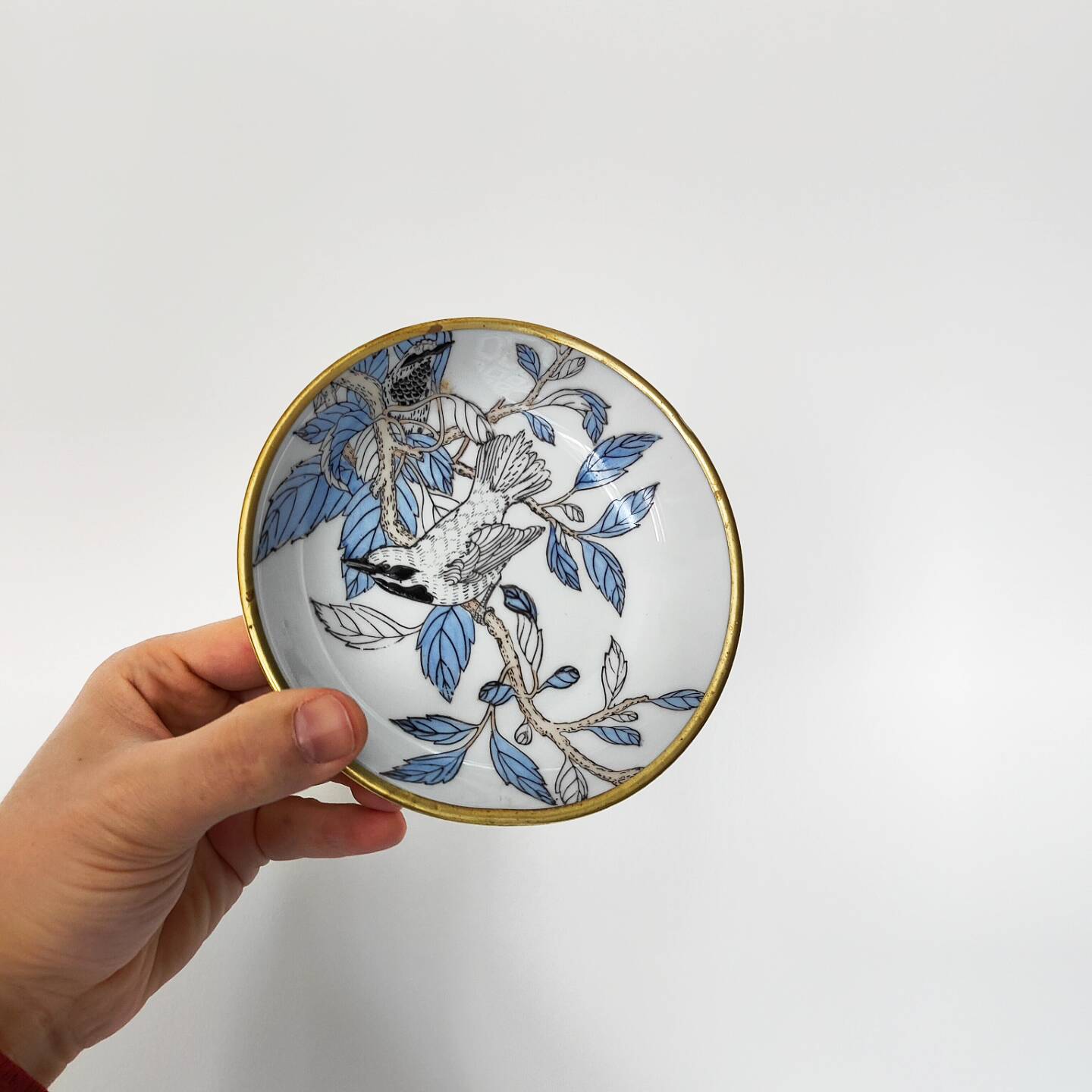 Porcelain and brass bowl