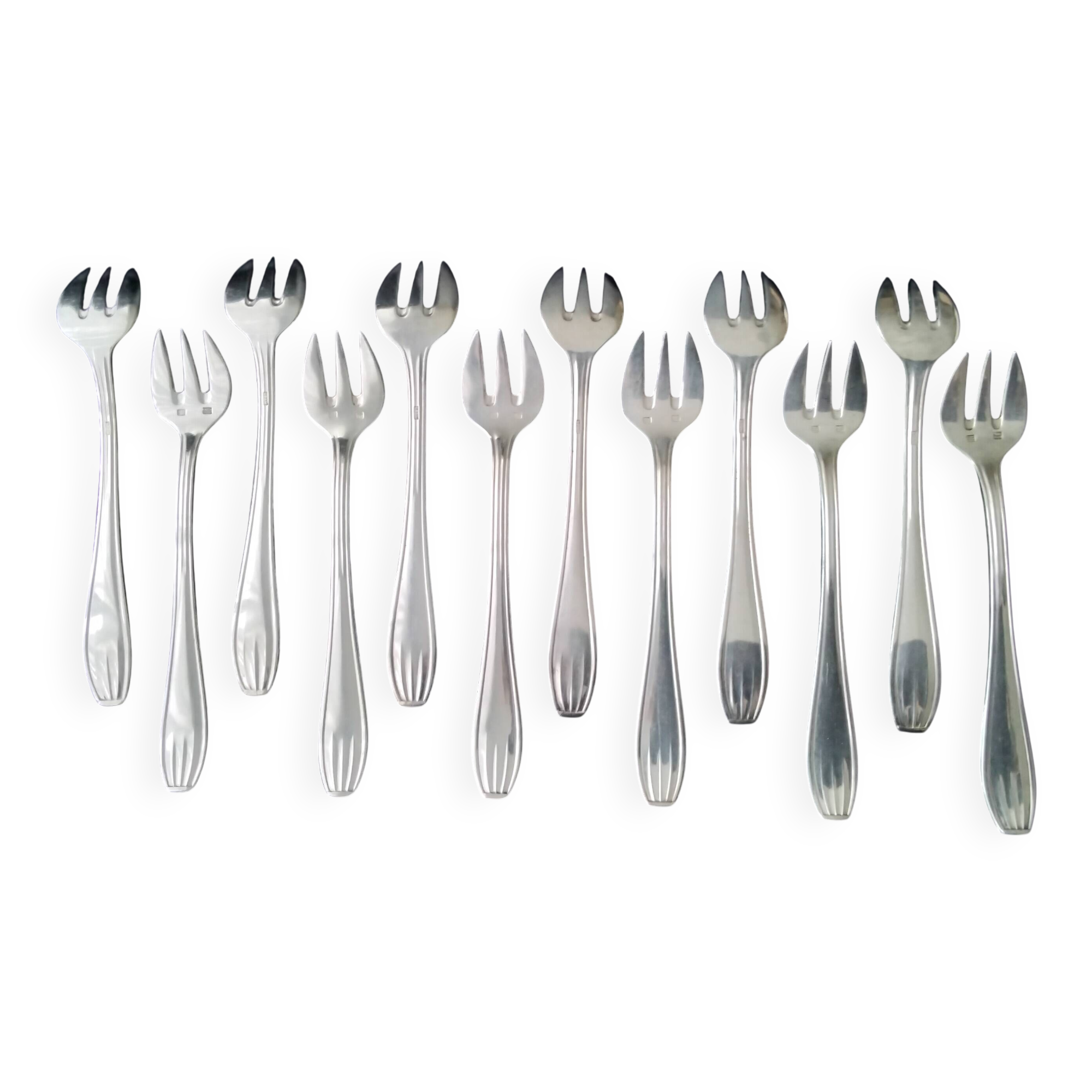 Coffret de 12 fourchettes à huitres en métal argenté