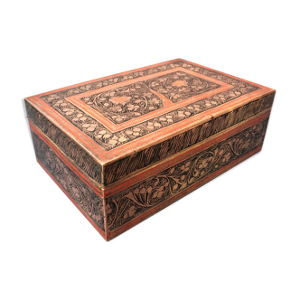 Old box in chiseled and carved brass