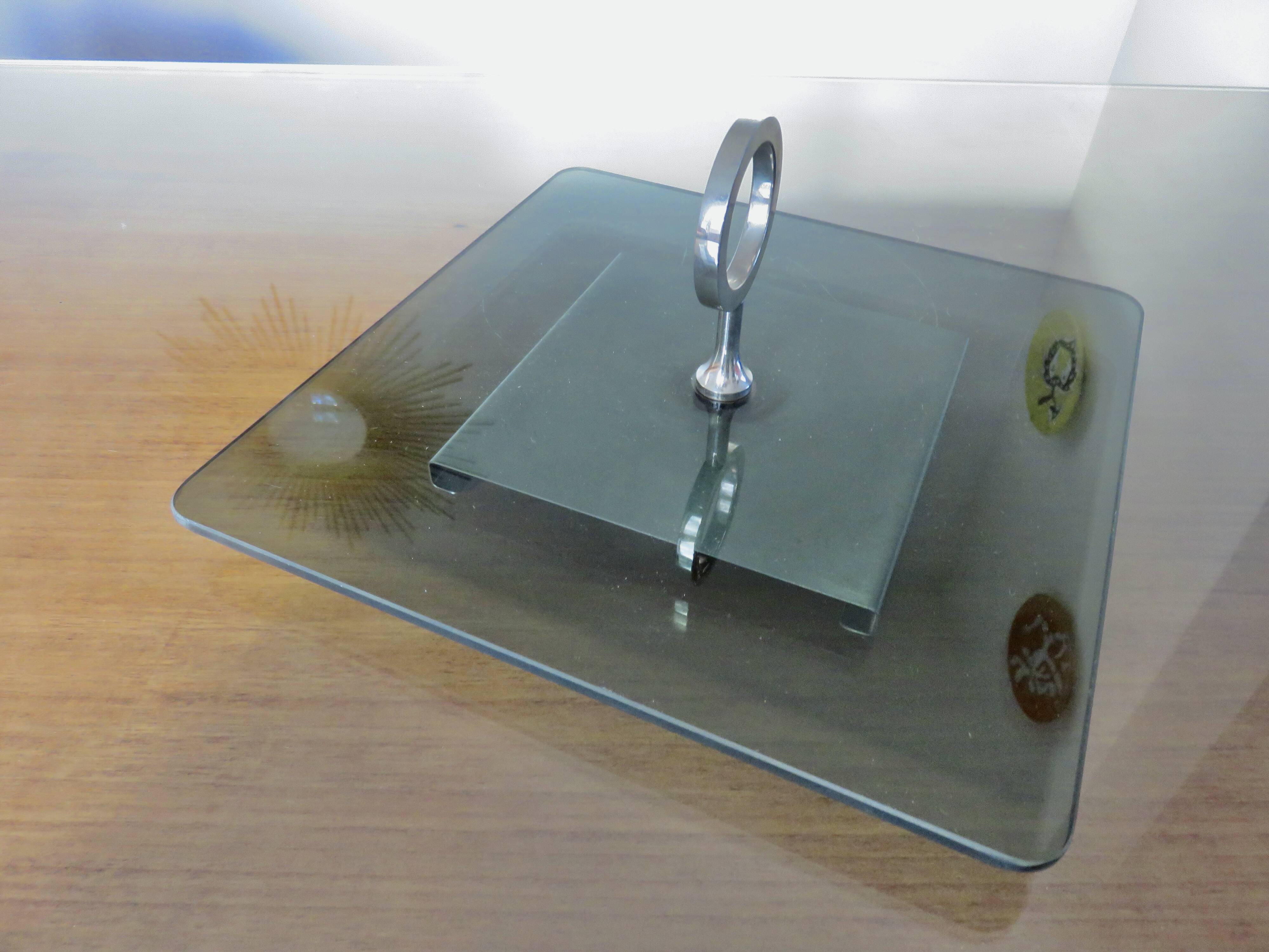 Modernist revolving serving tray, in smoked glass and silver-plated metal, 70.