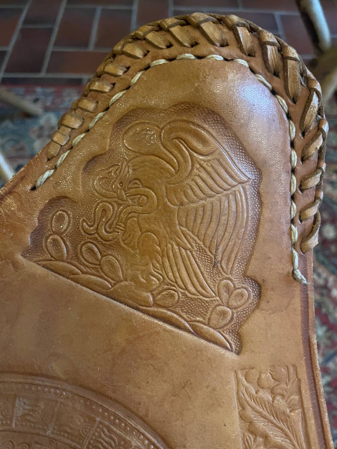 Vintage Mexican tripod stools in bamboo and leather.
