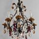 Lustrous chandelier with pendants and glass fruits, Maison Baguès, six lights.