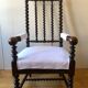 Fauteuil à haut dossier de style Louis XIII