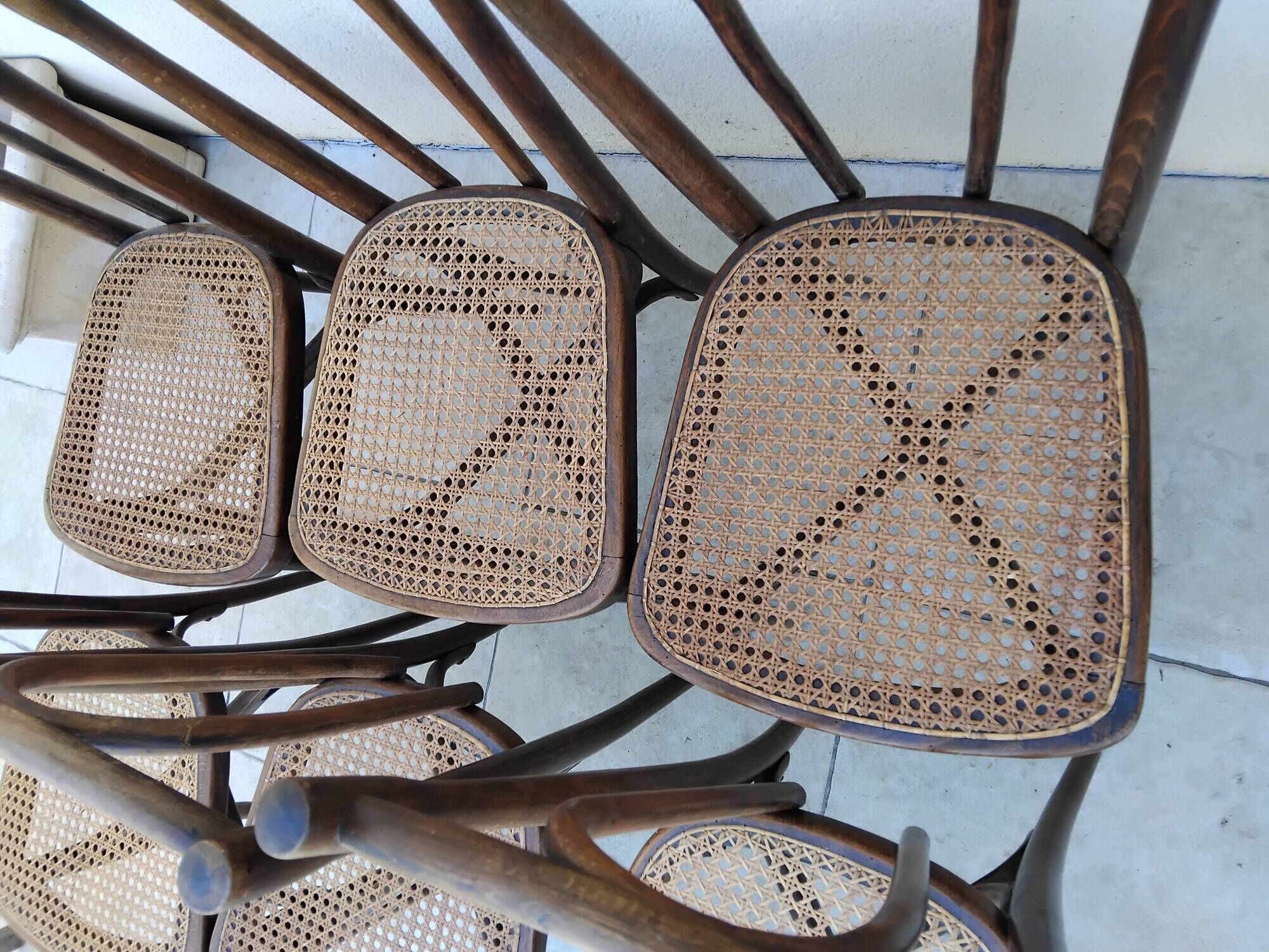 6 antique bistro chairs with curved wood and caning from 1900 L&H Cambier Frères
