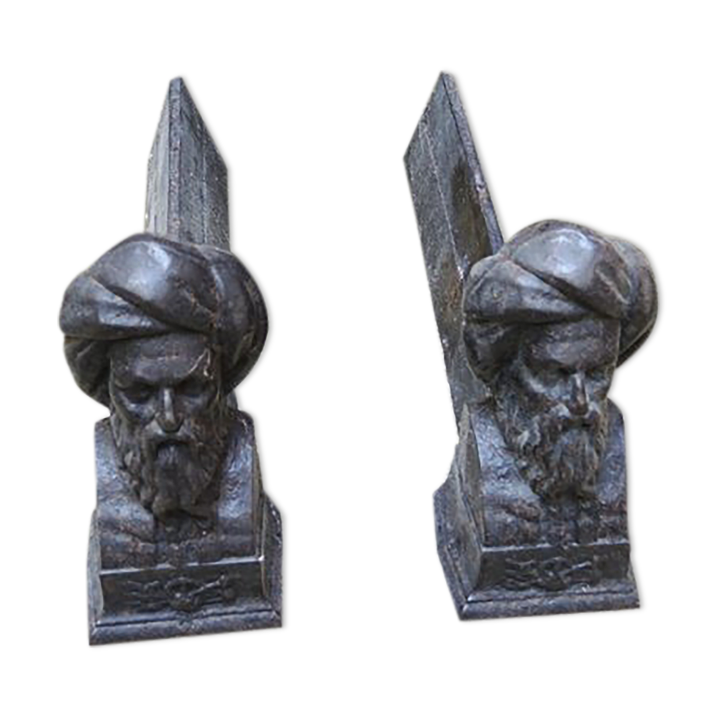 Pair of men's cast iron channels with turban