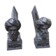 Pair of men's cast iron channels with turban