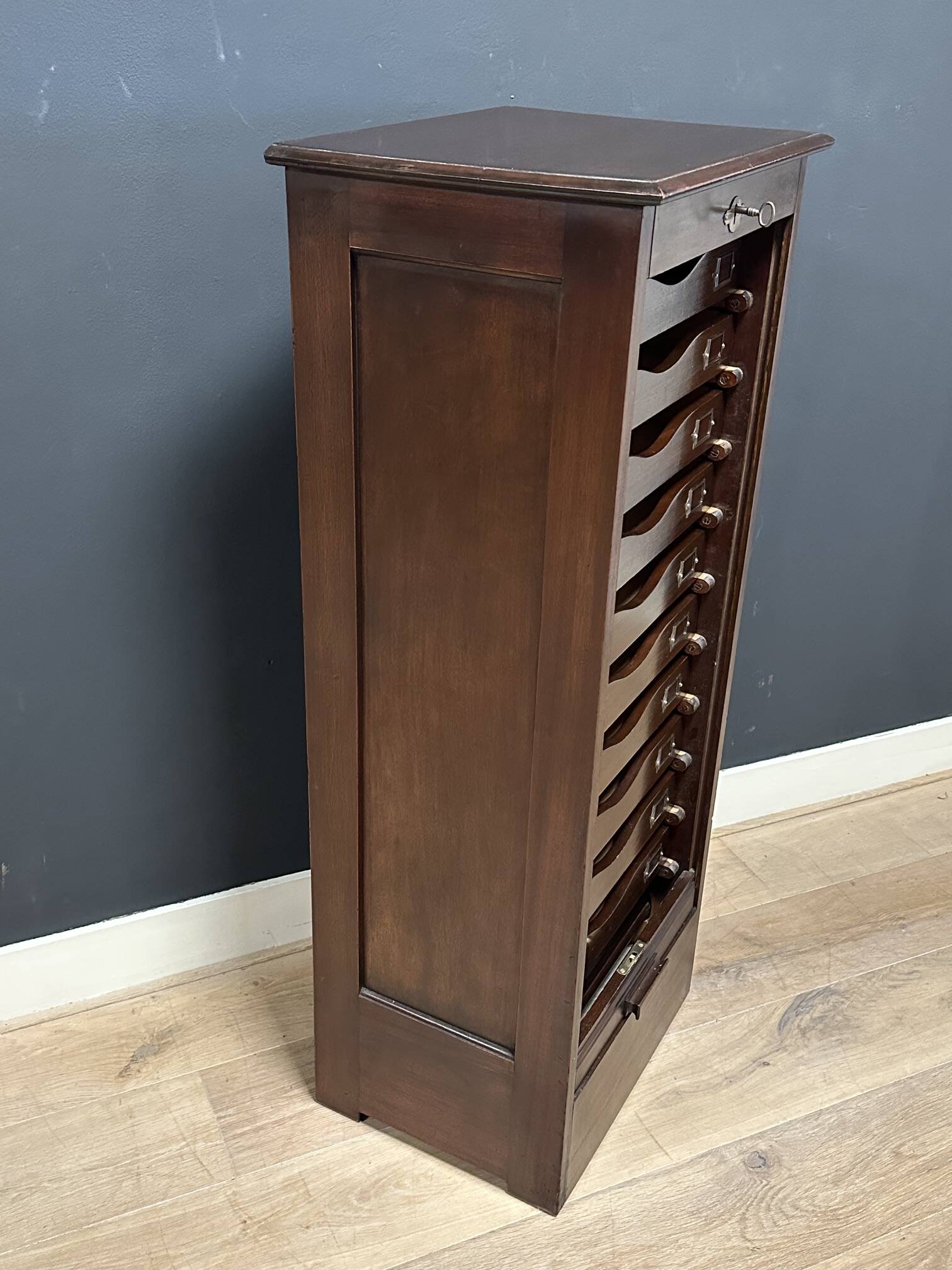 Antique mahogany roll-top filing cabinet with 10 drawers