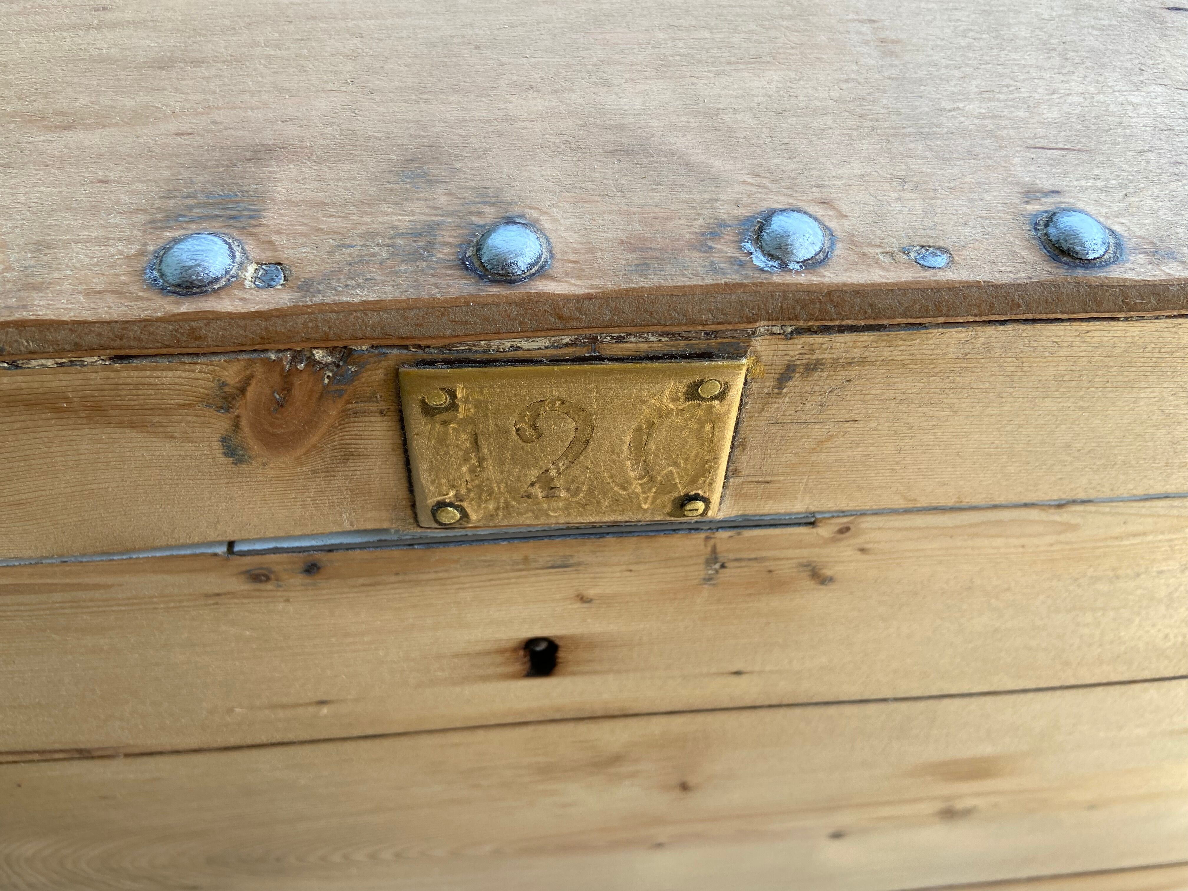 Raw wooden chest with a secret drawer
