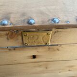 Raw wooden chest with a secret drawer