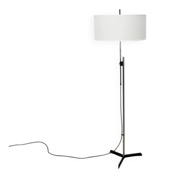 Mid-century German minimalist tripod floor lamp from the 1960s.