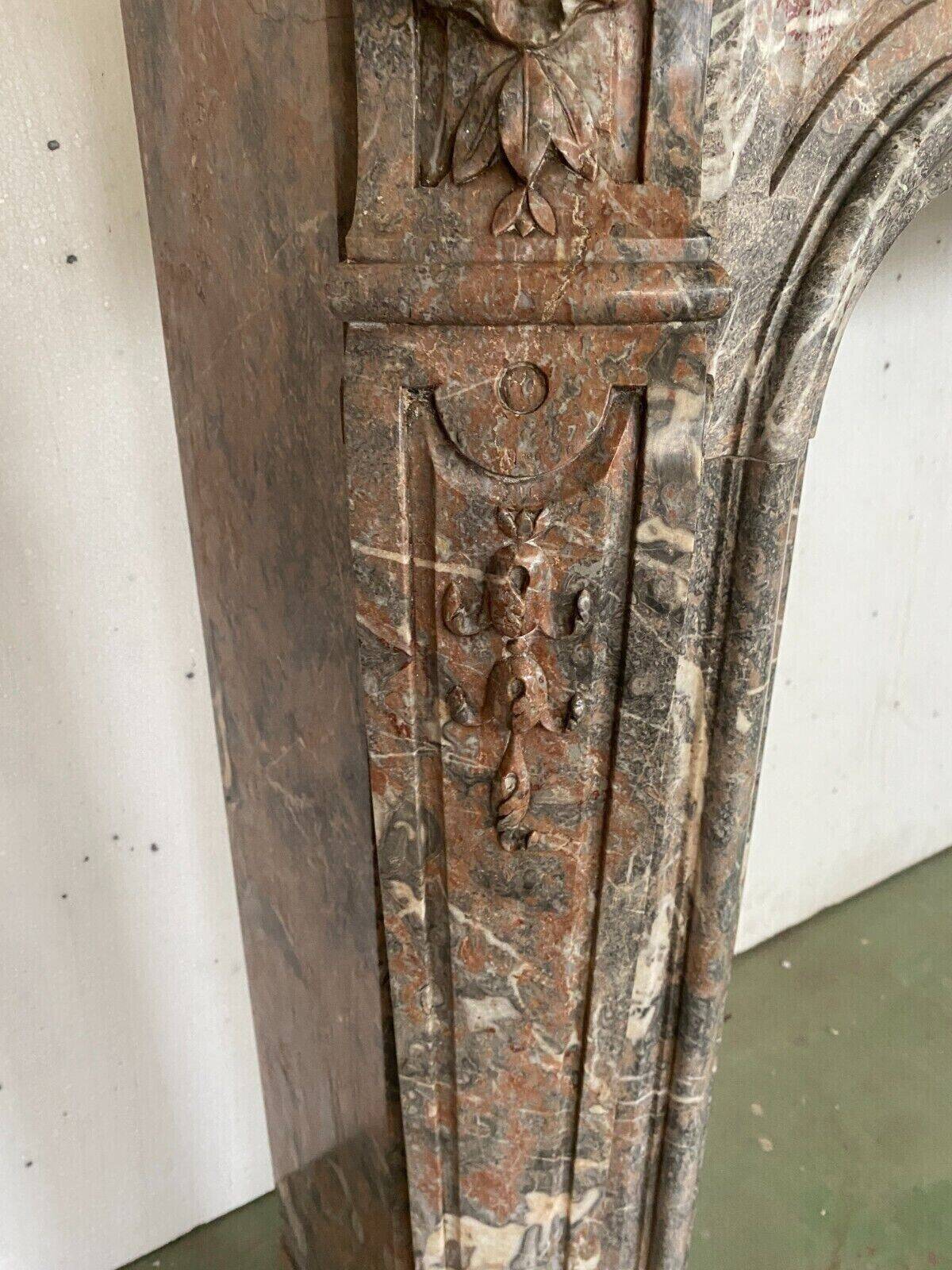Louis XV style fireplace in red breche marble 19th century