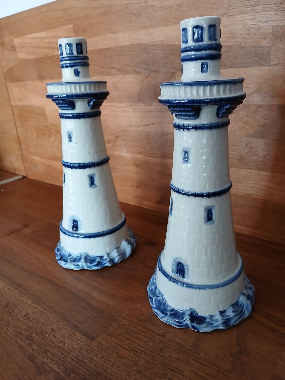 Pair of lighthouse-shaped candle holders