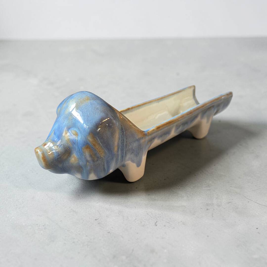 Pig sausage holder