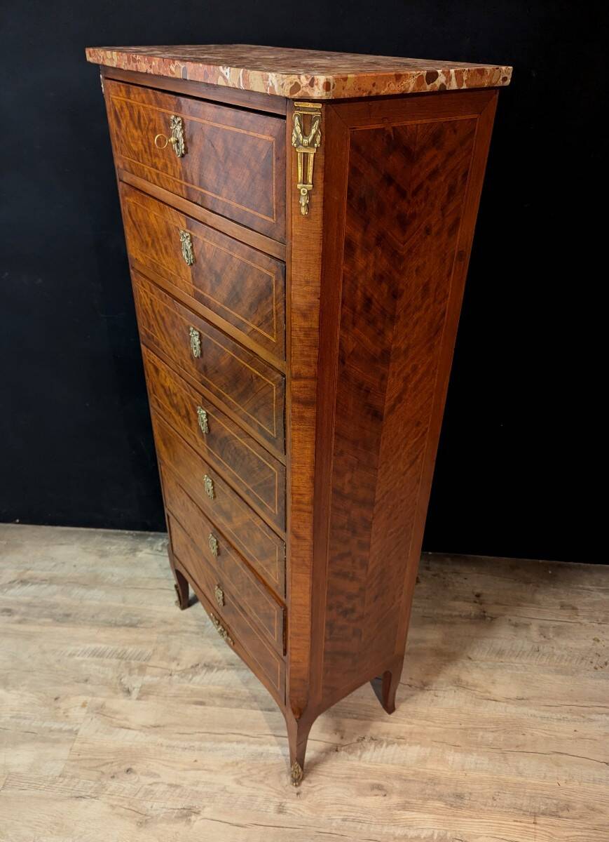 Louis XV chest of drawers in marquetry, with a marble top.