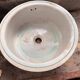 Cylindrical stoneware sinks