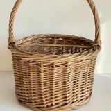 Basket with vintage rattan bottles