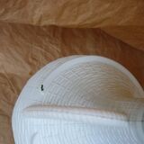 Bonbonne 4L verte entourée de plastique blanc