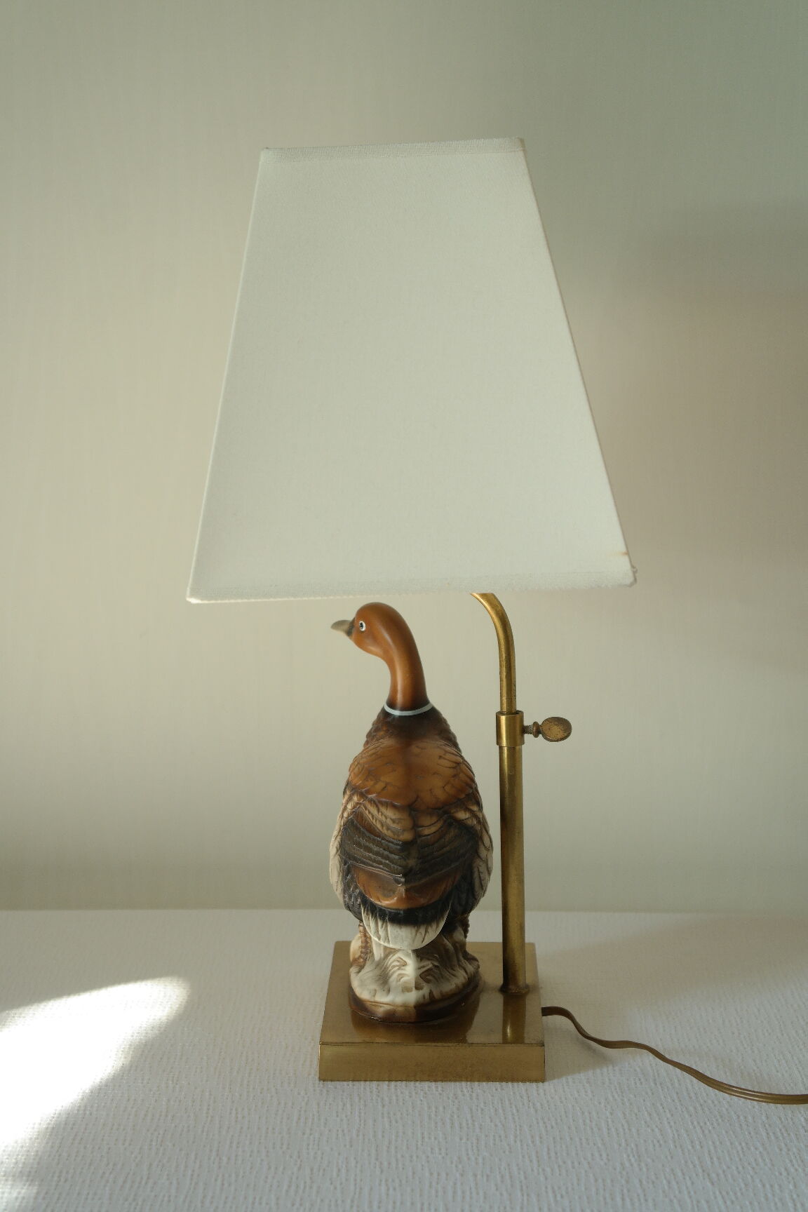 Ceramic duck table lamp and vintage adjustable brass