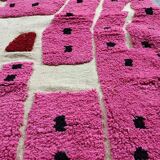 Handmade pure wool rug in pink, size 150 x 250 cm.