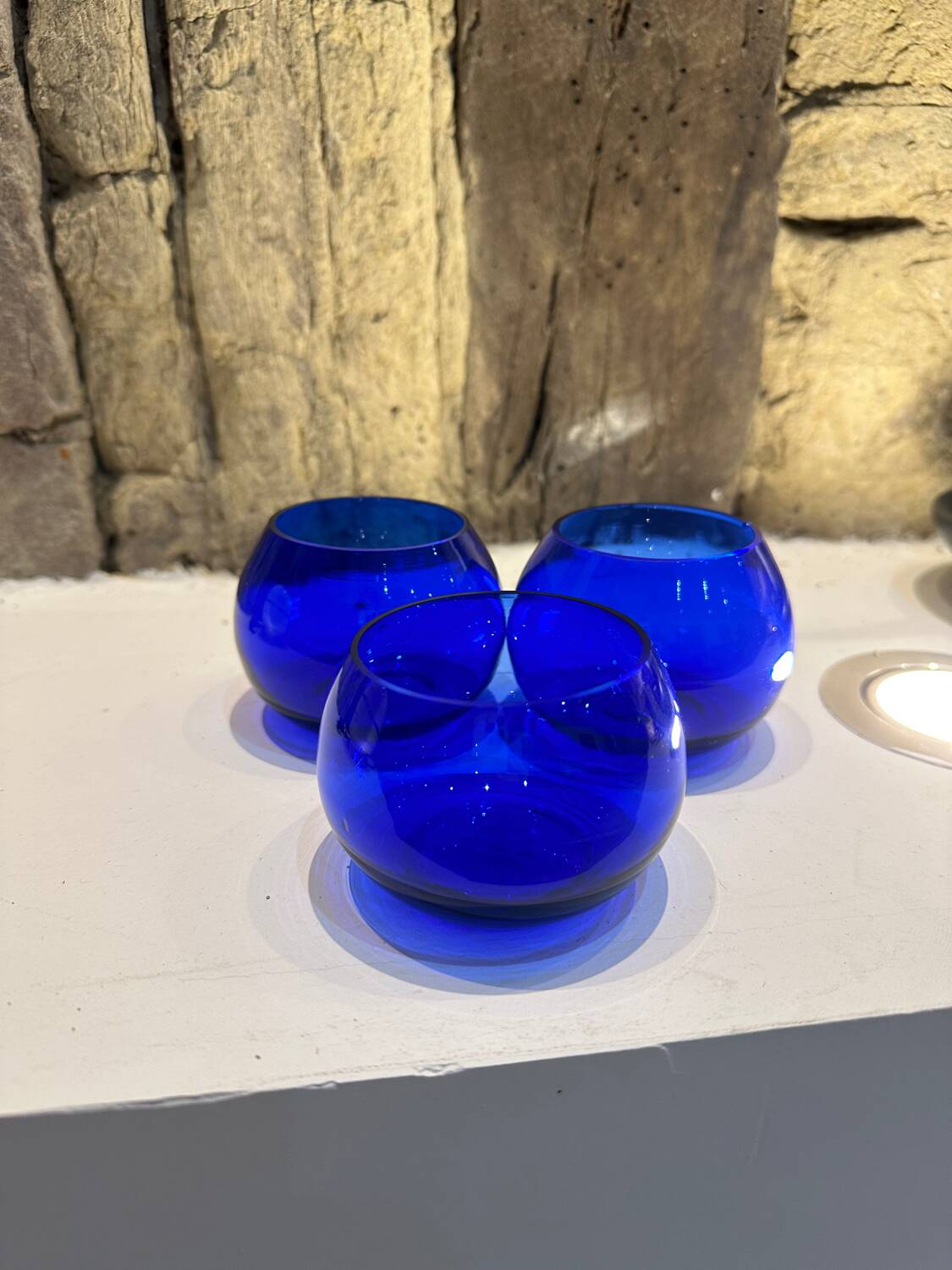 Set of 3 blue glass candle holders