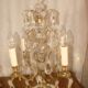 Four-candle girandole in bronze and crystal, early 20th century.