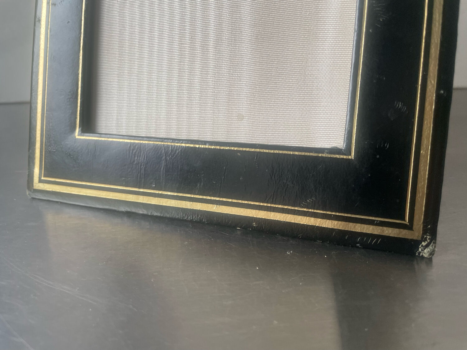 Antique black leather  with gilding frame measurements 19 cm x 15 cm