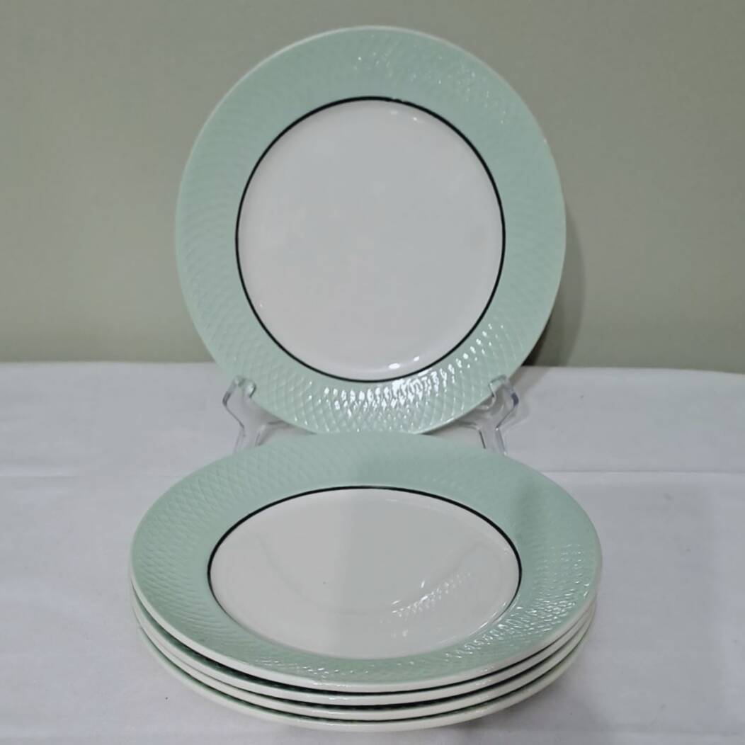 Set of 5 Moulin des loups flat plates.