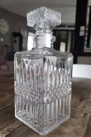 Vintage whiskey decanter in diamond faceted glass airtight stopper