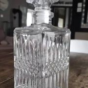 Vintage whiskey decanter in diamond faceted glass airtight stopper