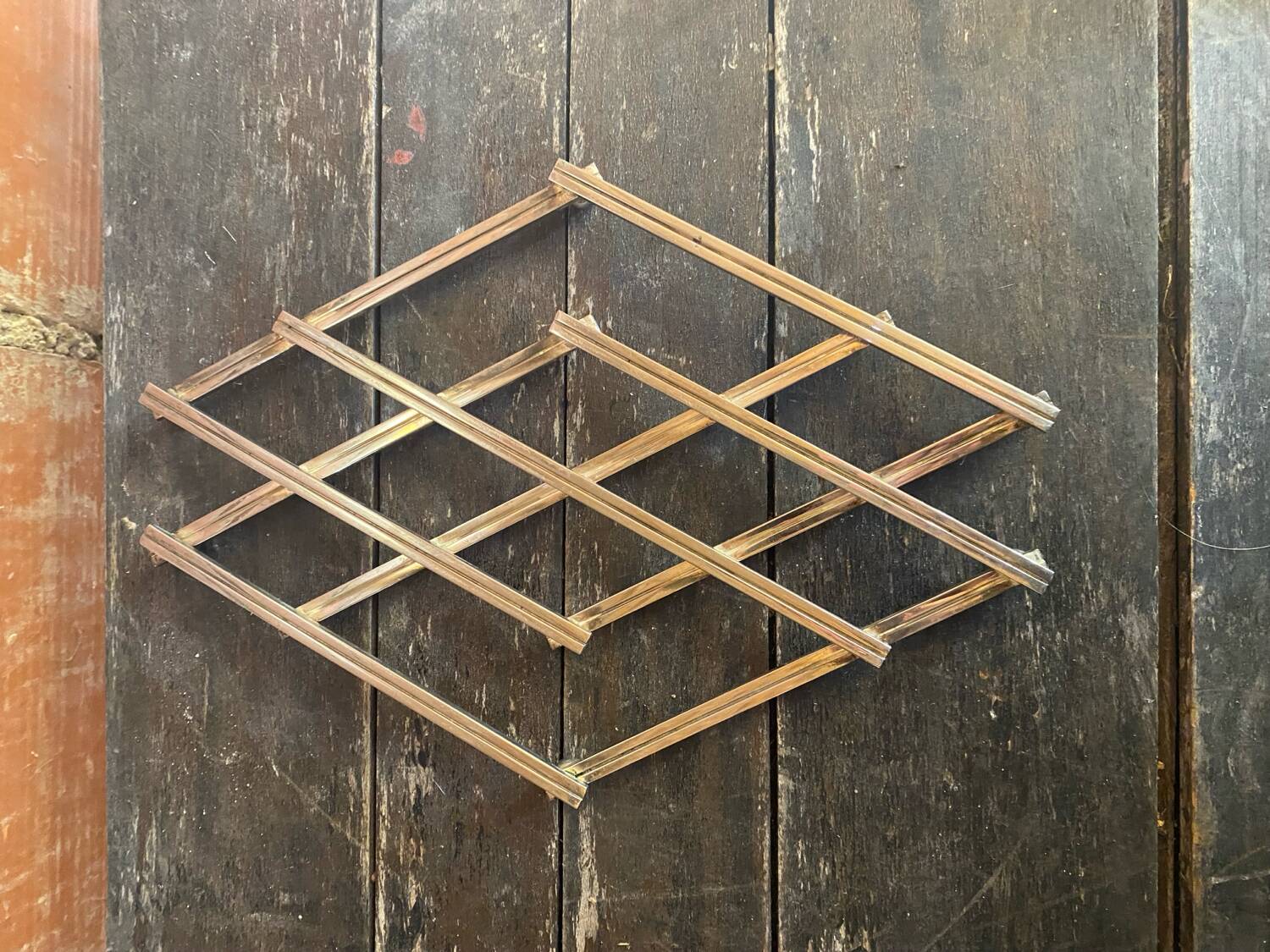 Dessous de plat ancien jacques adnet extensible métal argenté 1950 vin