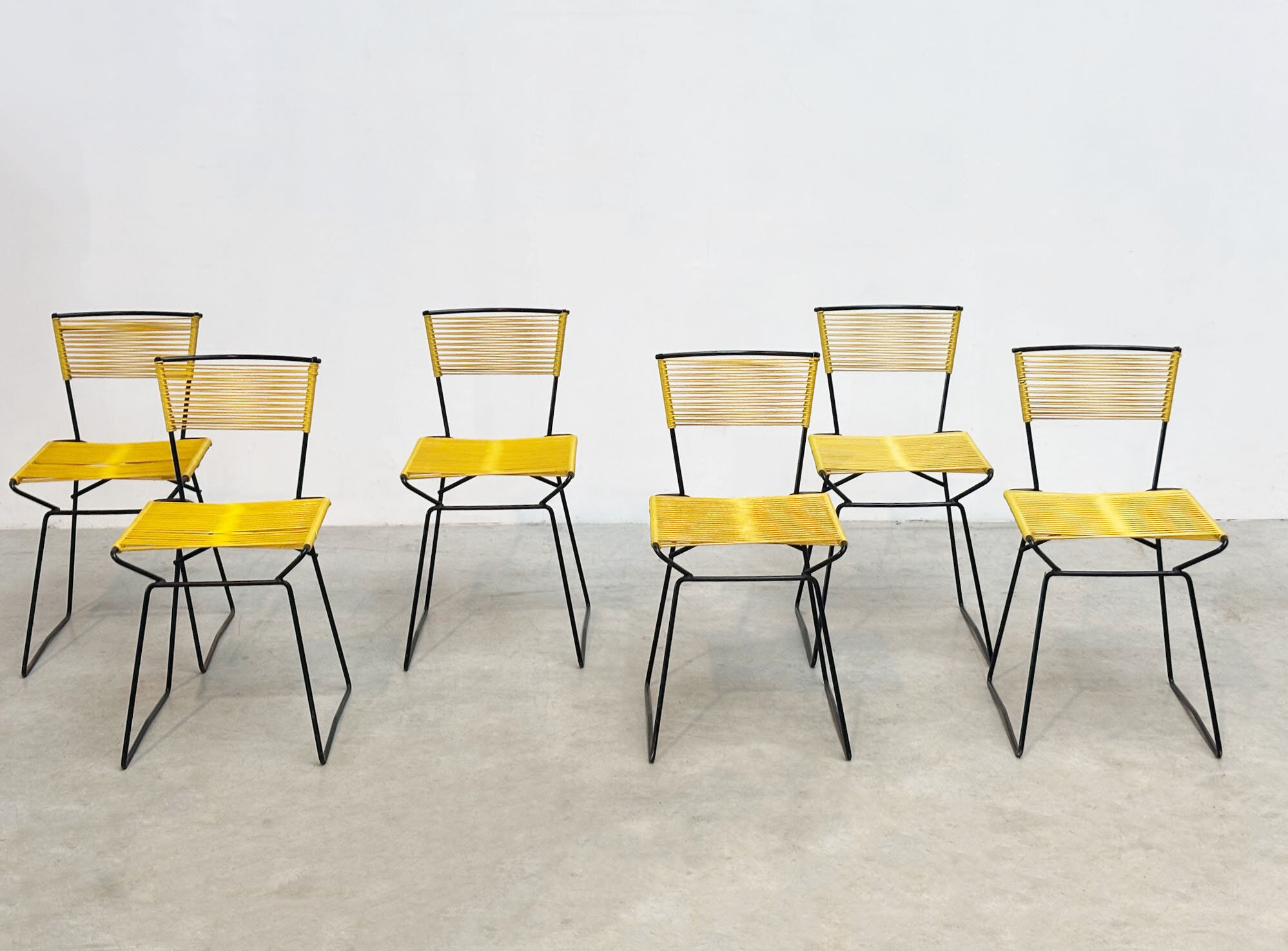 Set of six 'Spaghetti' dining chairs