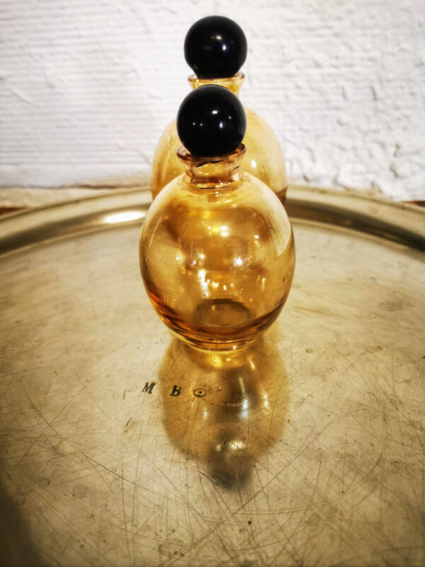 Duo of small amber bottles