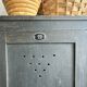 Old wooden locker with black patina