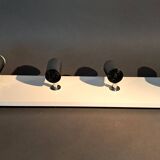 Targetti Sankey spotlights on white lacquered wooden ramp