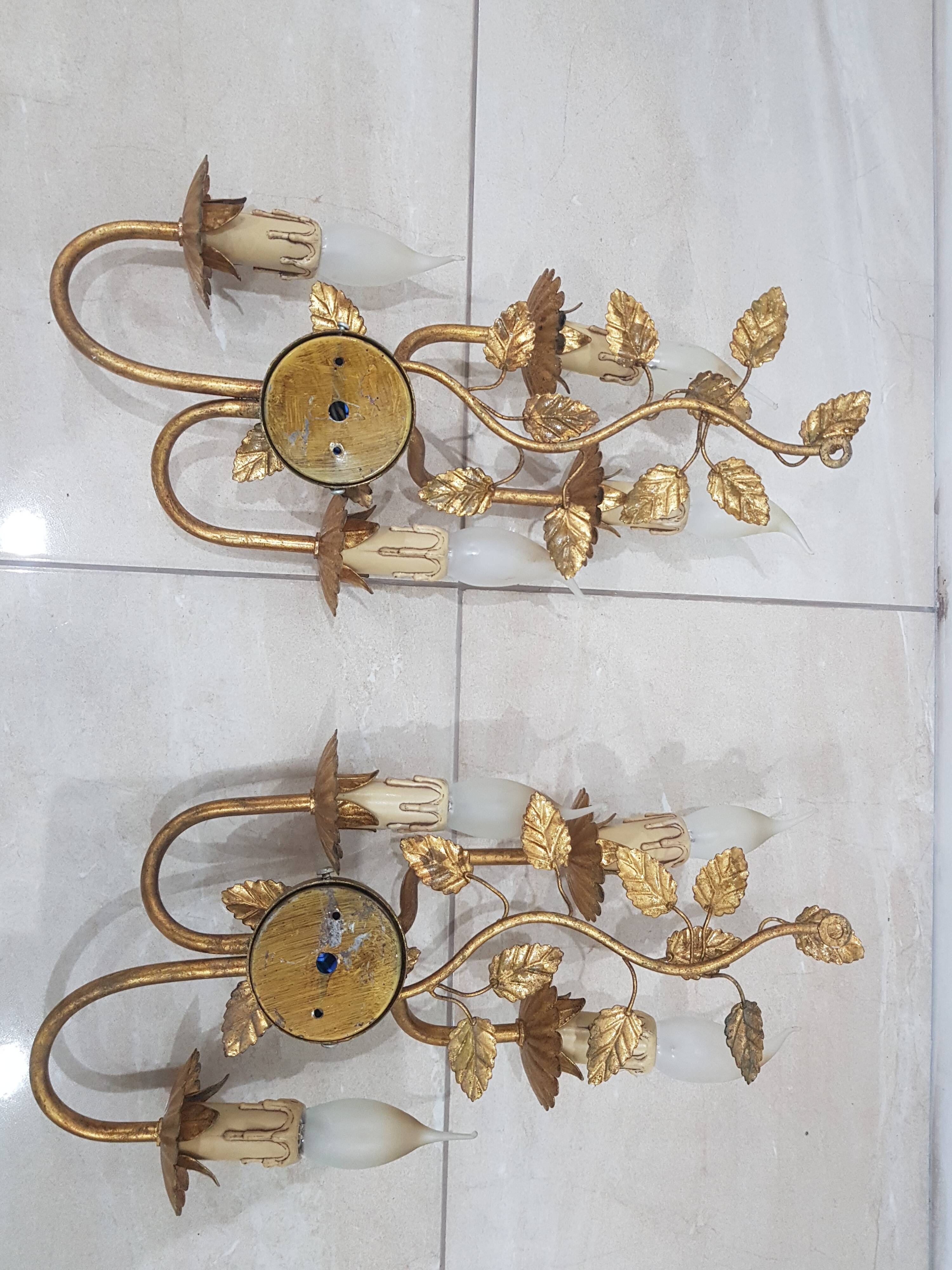 A pair of wall lamps / Coco Chanel / Hollywood Regency / France, 1960s