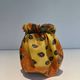 Trompe-l'Œil Ceramic Vase in the Shape of a Knotted Bag with Floral Decoration. Work