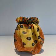 Trompe-l'Œil Ceramic Vase in the Shape of a Knotted Bag with Floral Decoration. Work