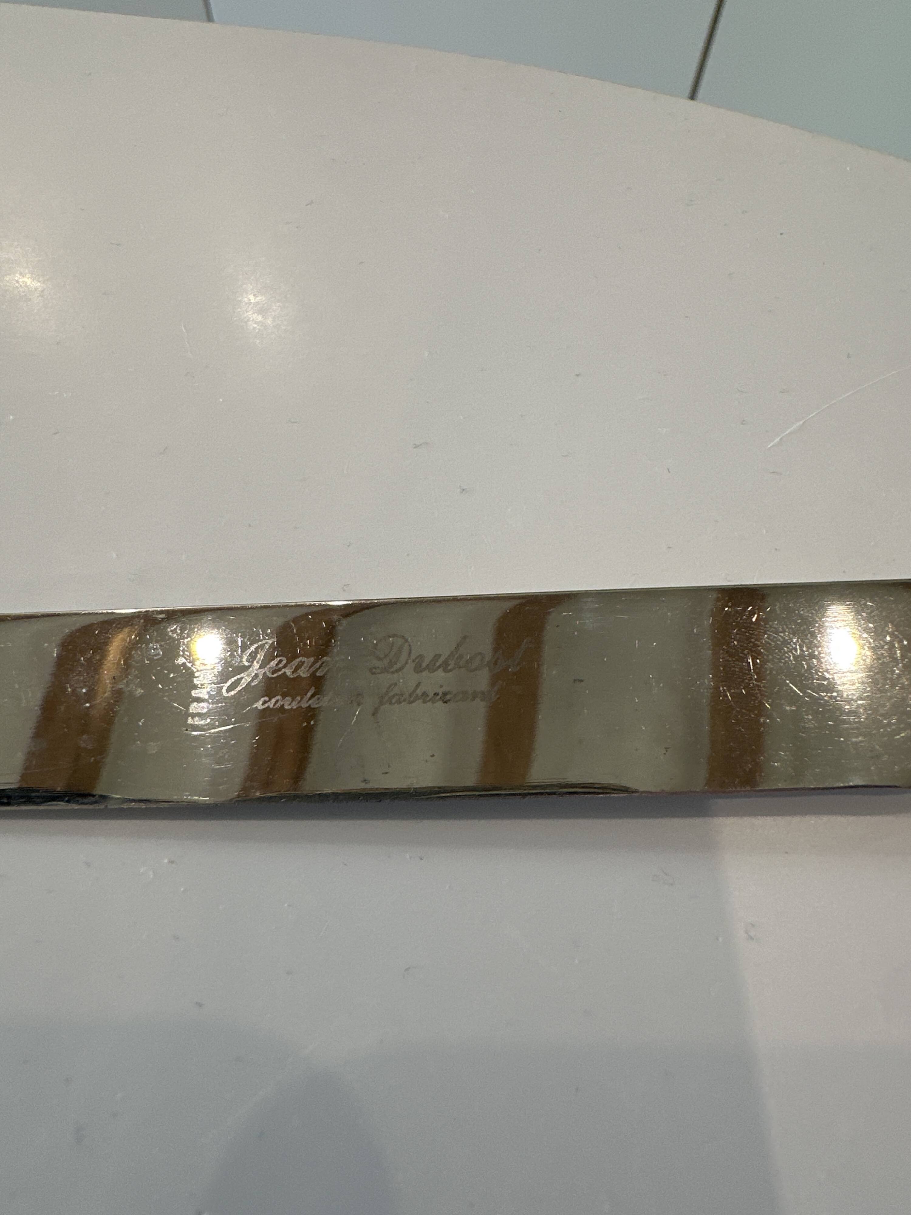 Set of 8 Jean Dubost knives