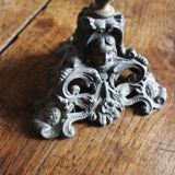Grey cherub church torch candlestick