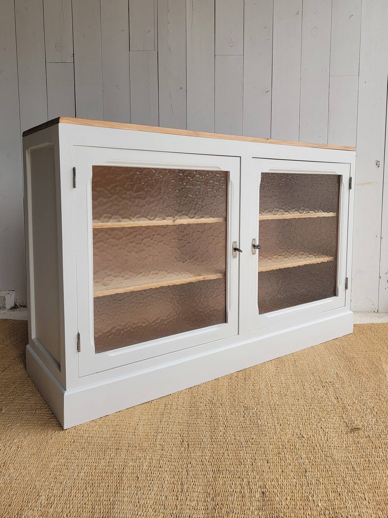Beige glass and wood sideboard
